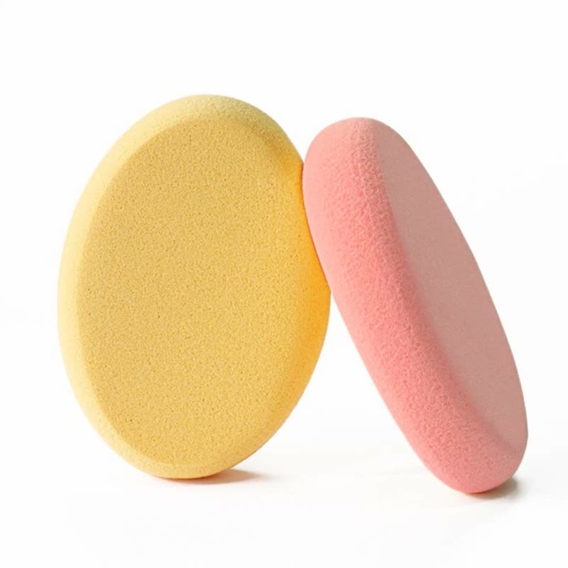 Pink and cream powder puffs